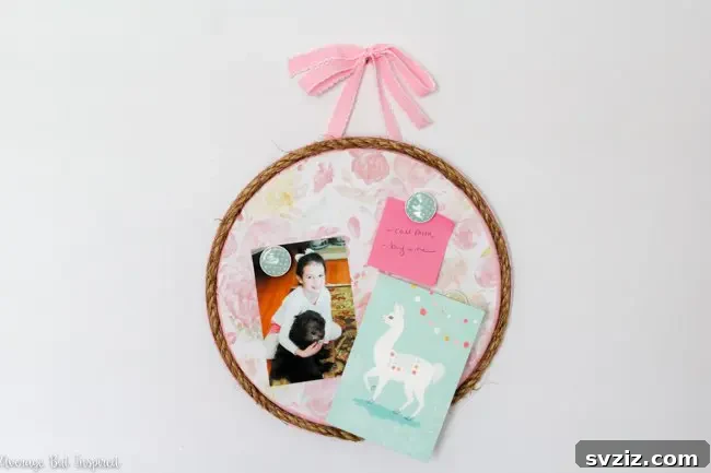 DIY magnet board made from a Dollar Tree pizza pan for notes and kids' magnets