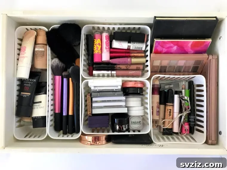 Organized makeup drawer using small plastic bins from Dollar Tree