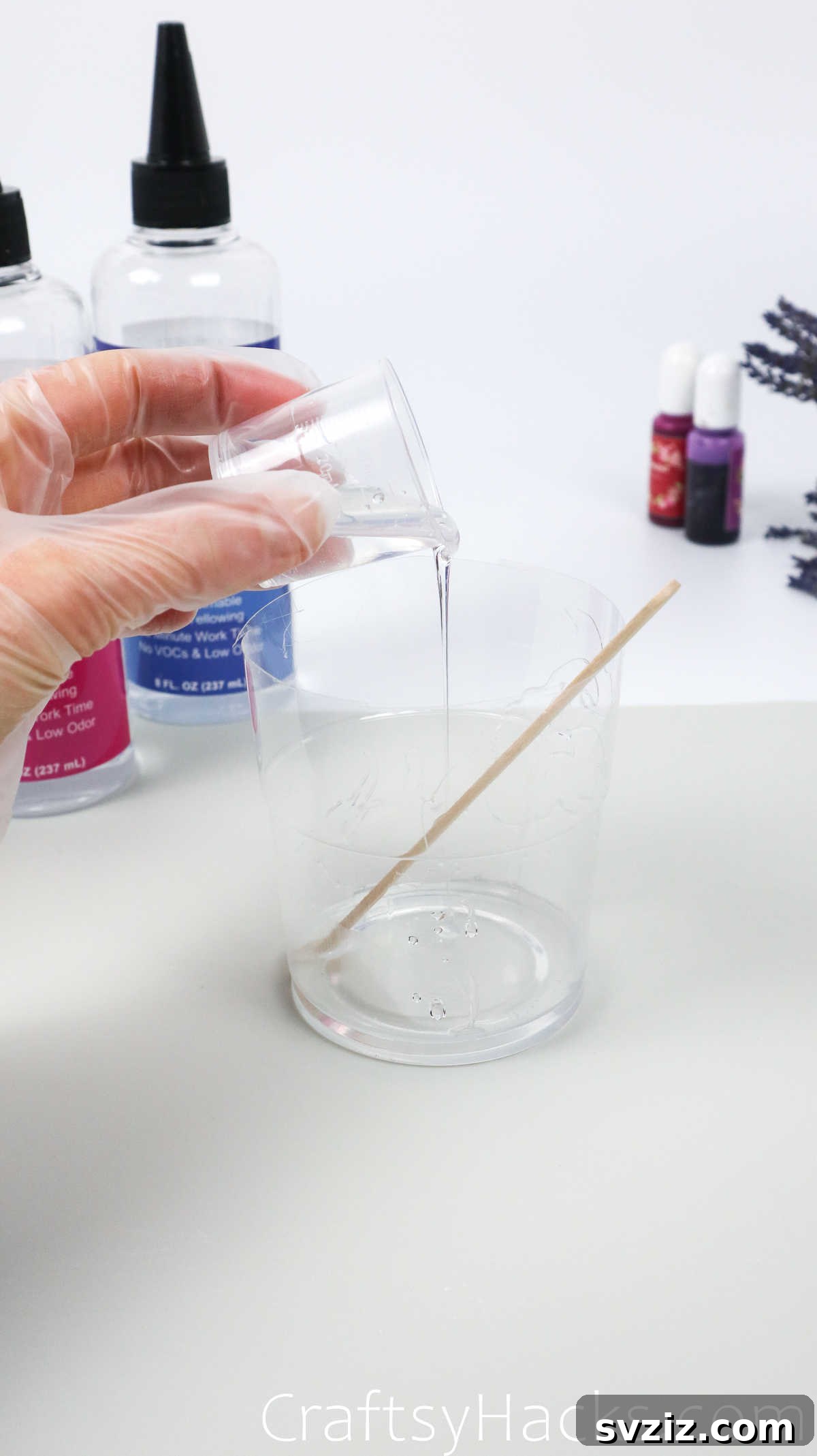 DIY Resin Keychains: Easy Steps for Stunning Accessories 12 pouring resin in cup