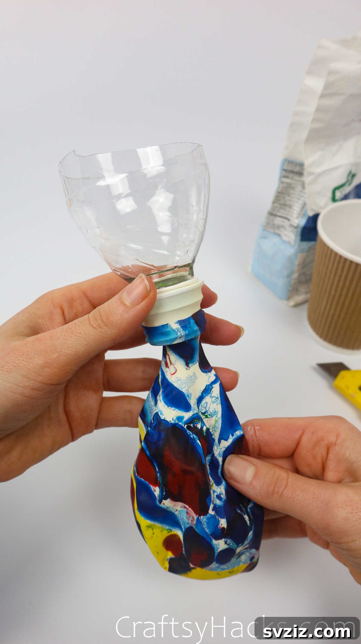 Craft Your Calming Stress Ball 18 Balloon securely attached to the mouth of the plastic bottle funnel
