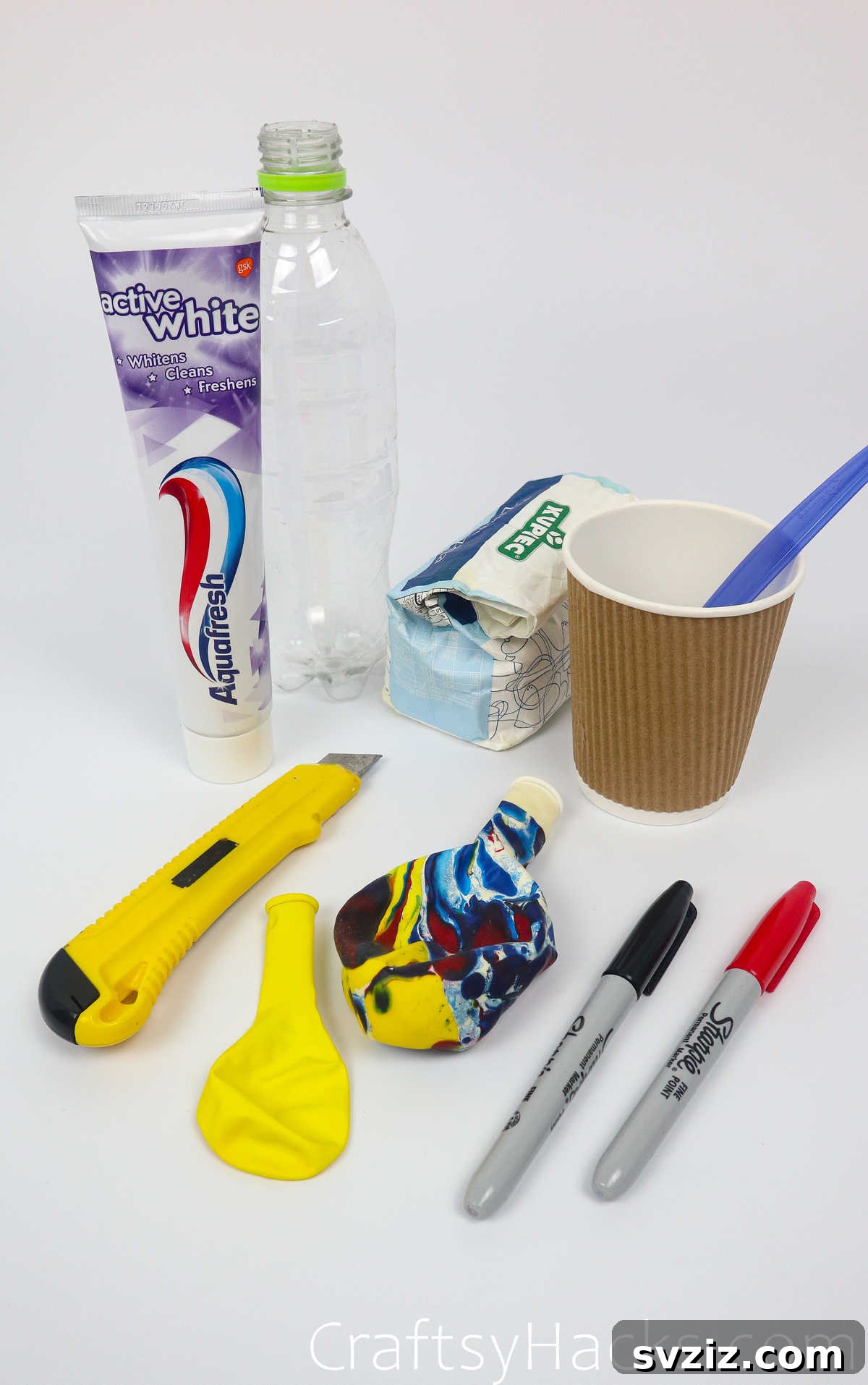 Craft Your Calming Stress Ball 5 Assortment of DIY stress ball supplies including balloons, plastic bottle, and tools