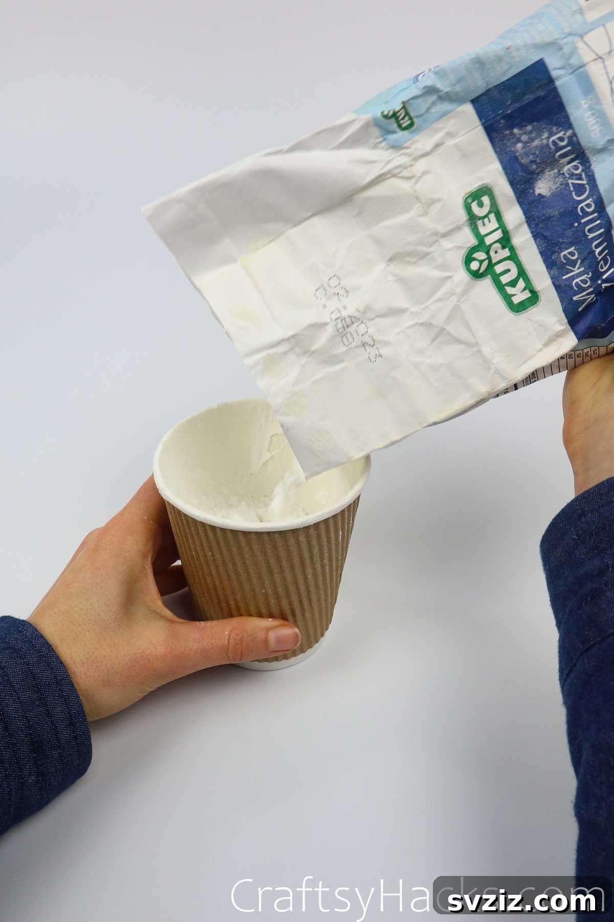 Craft Your Calming Stress Ball 8 Hand pouring wheat flour into a paper cup
