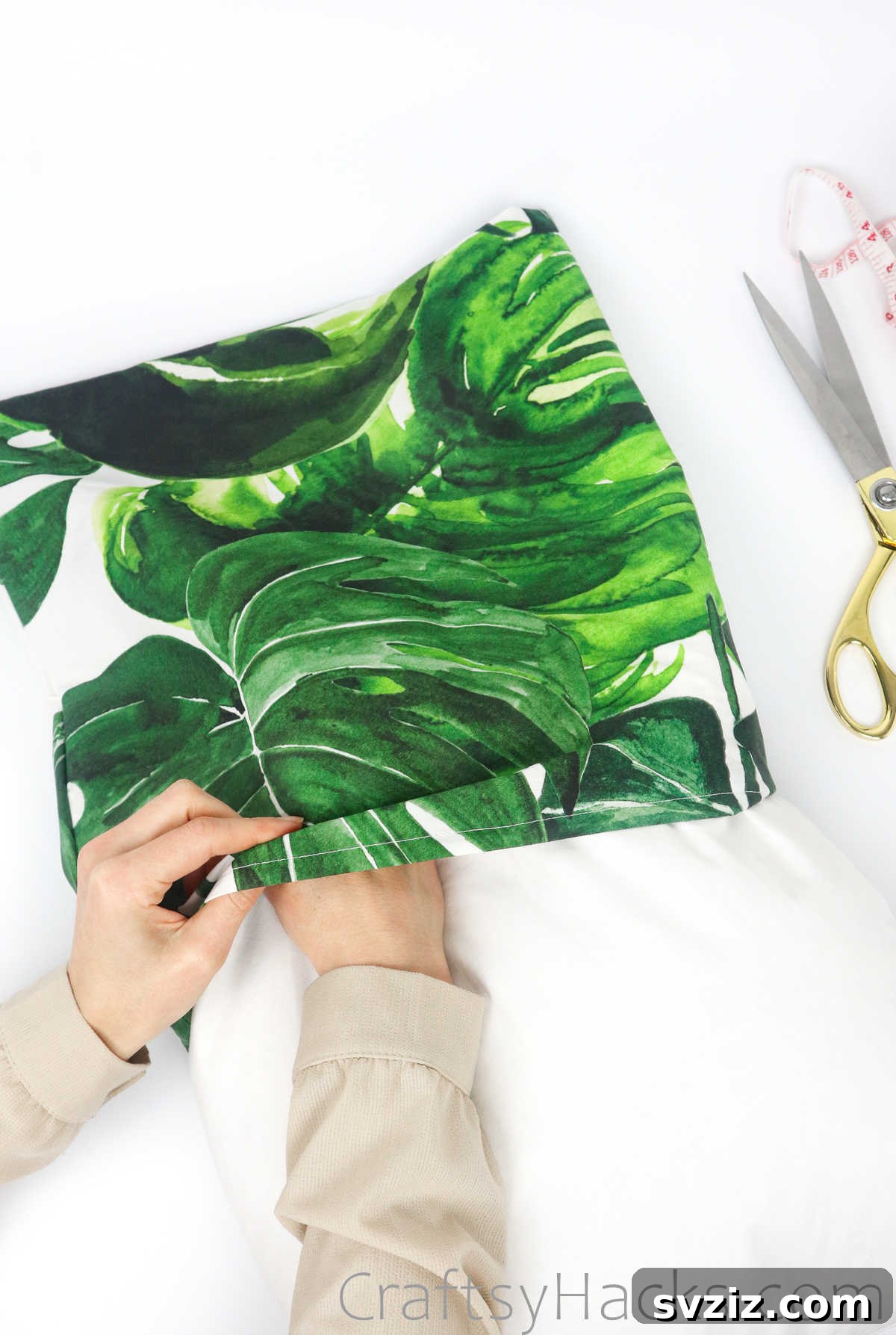 Putting a pillow insert into the newly made pillowcase