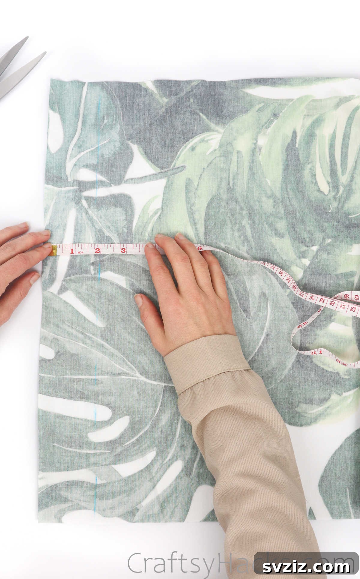 Measuring the cut fabric piece for accuracy