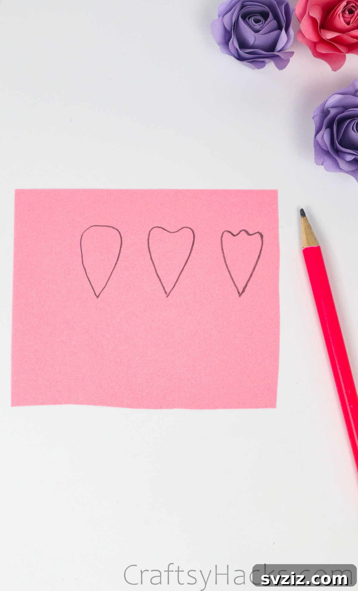 Your Simple Guide to Gorgeous Paper Roses 13 A closer look at the pencil-drawn petal outlines on the folded paper, encouraging diverse designs