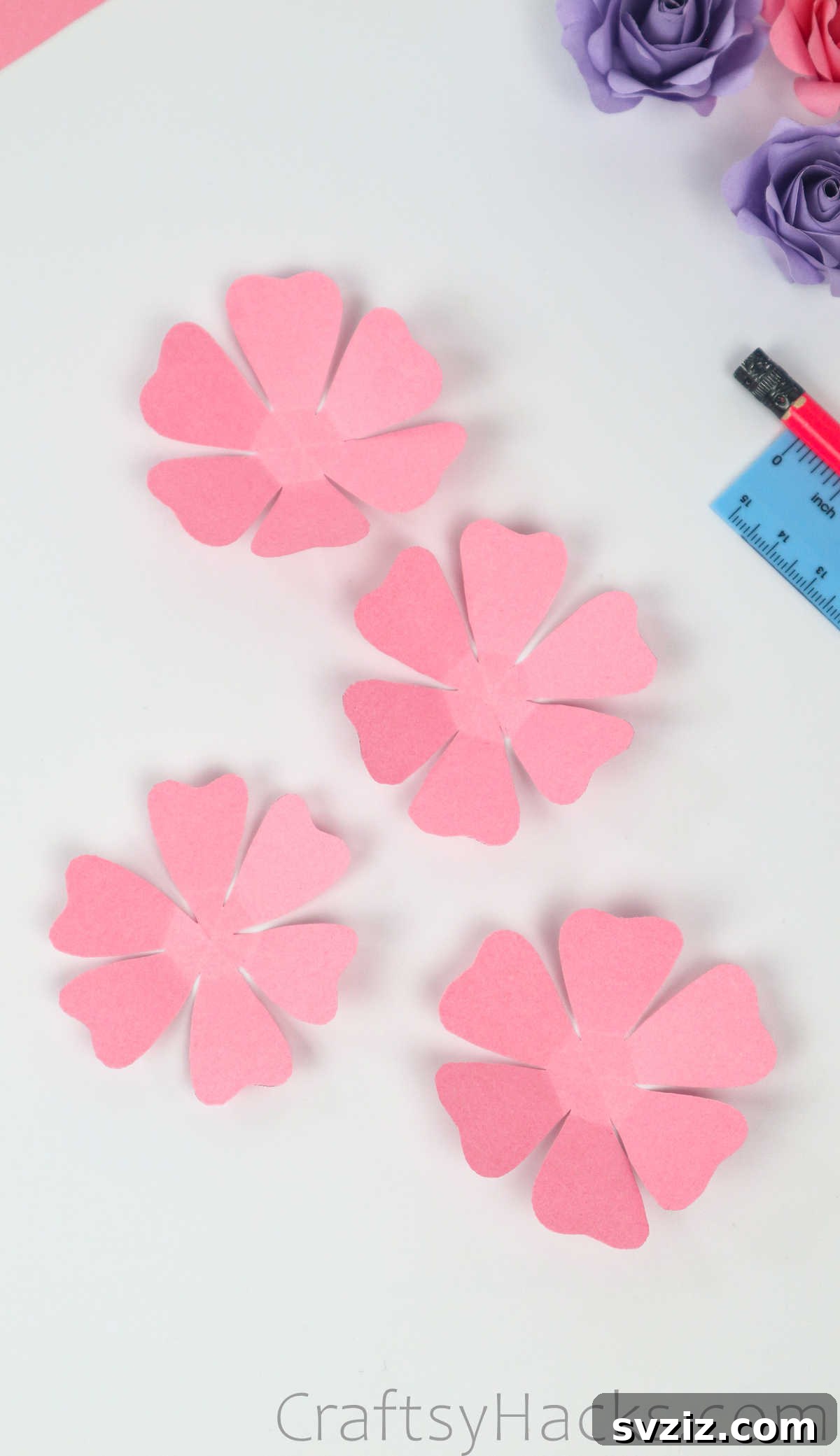Your Simple Guide to Gorgeous Paper Roses 20 The stack of folded petals, now resembling a hexagonal cup shape, ready for individual shaping