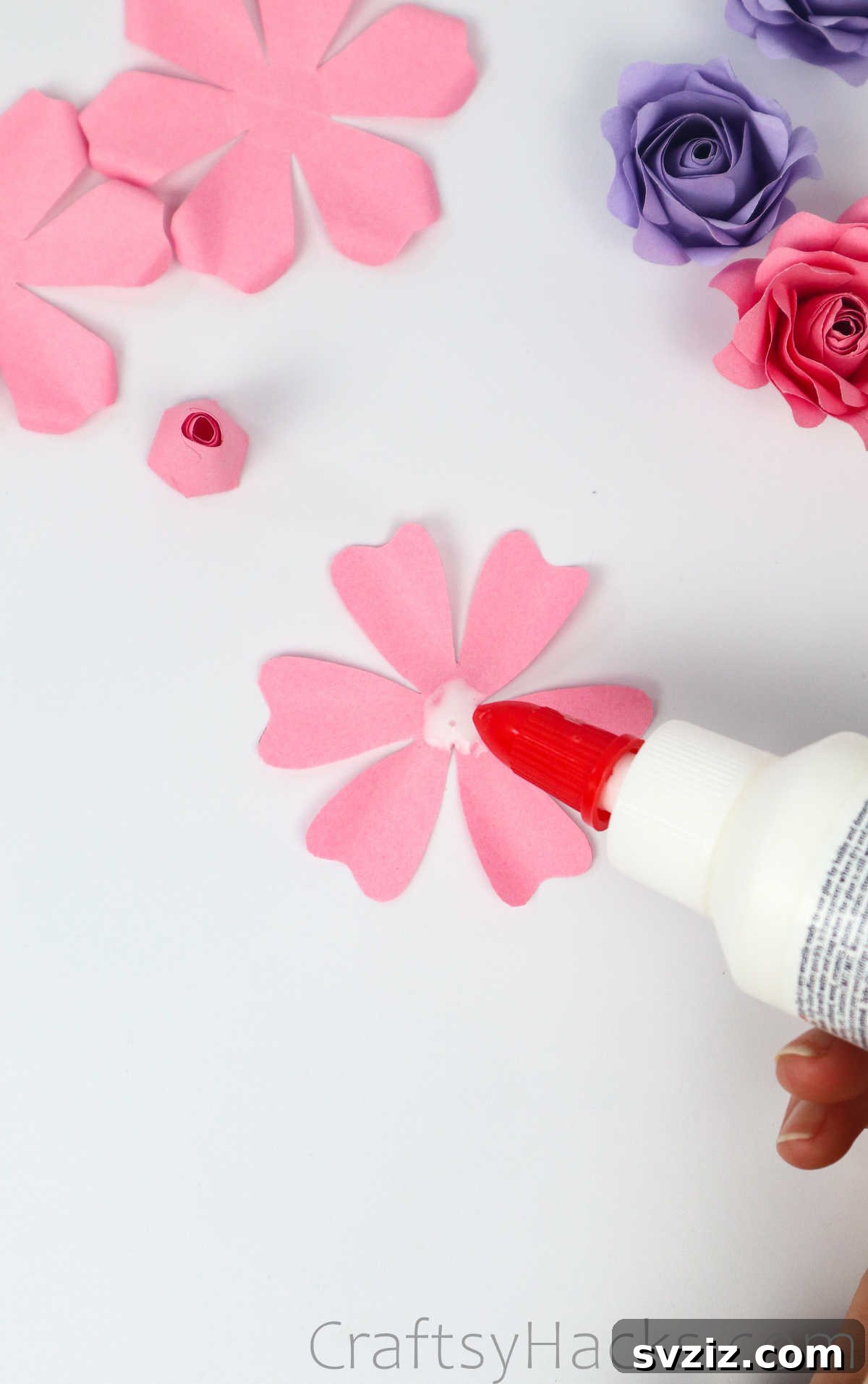 Your Simple Guide to Gorgeous Paper Roses 38 Glue applied to the center of a paper flower piece, ready for the rose bud