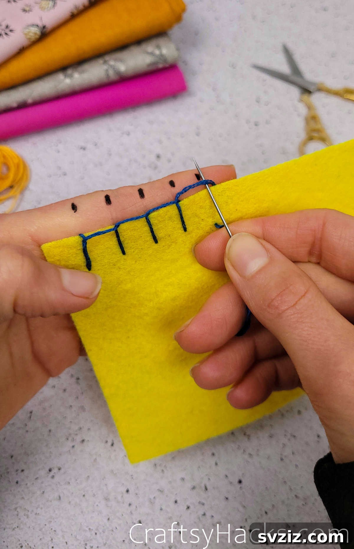Creative sewing hack: using your finger as a guide for even stitches