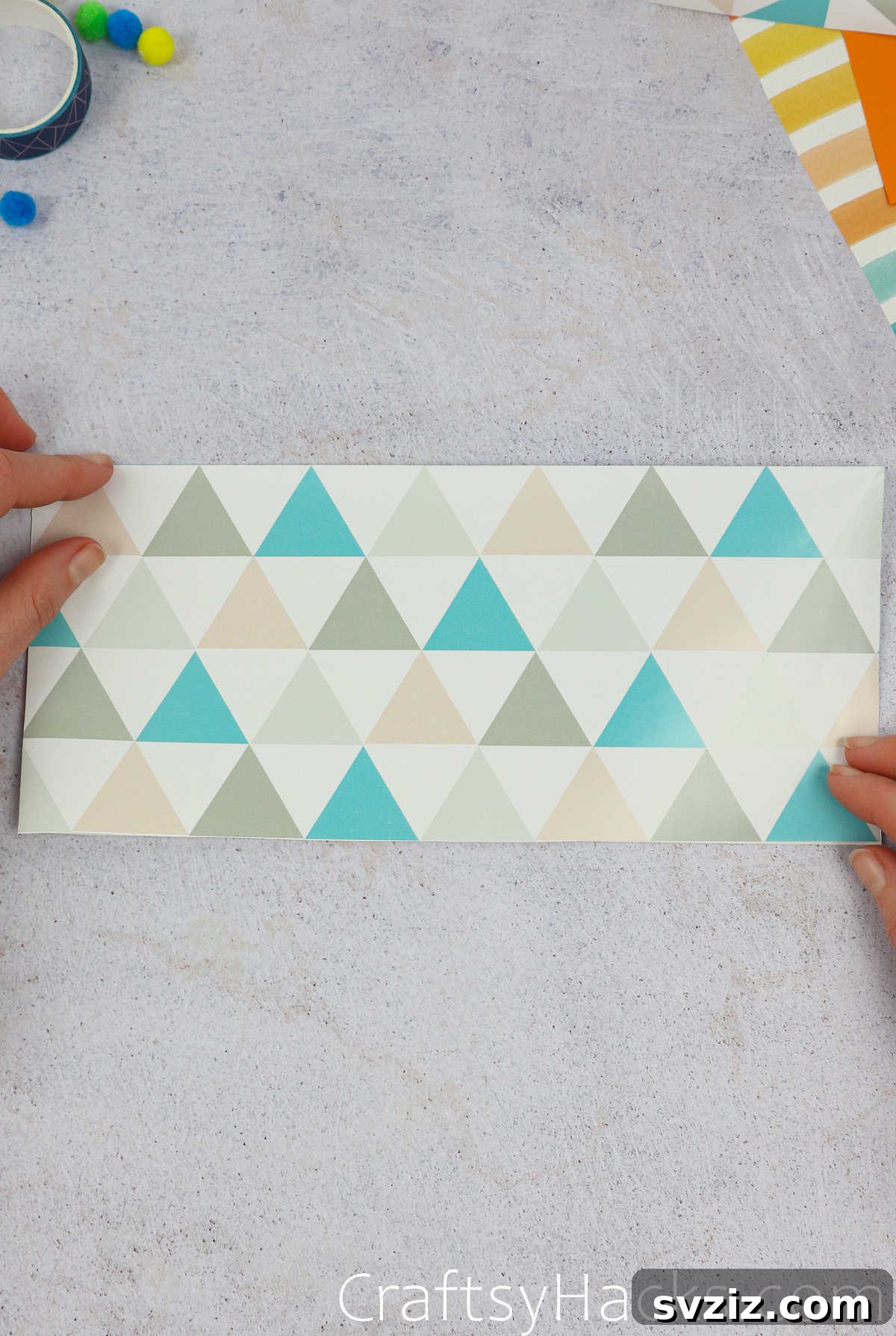 The fully folded paper hat, now ready for decoration and customization, showcasing its simple but sturdy structure.