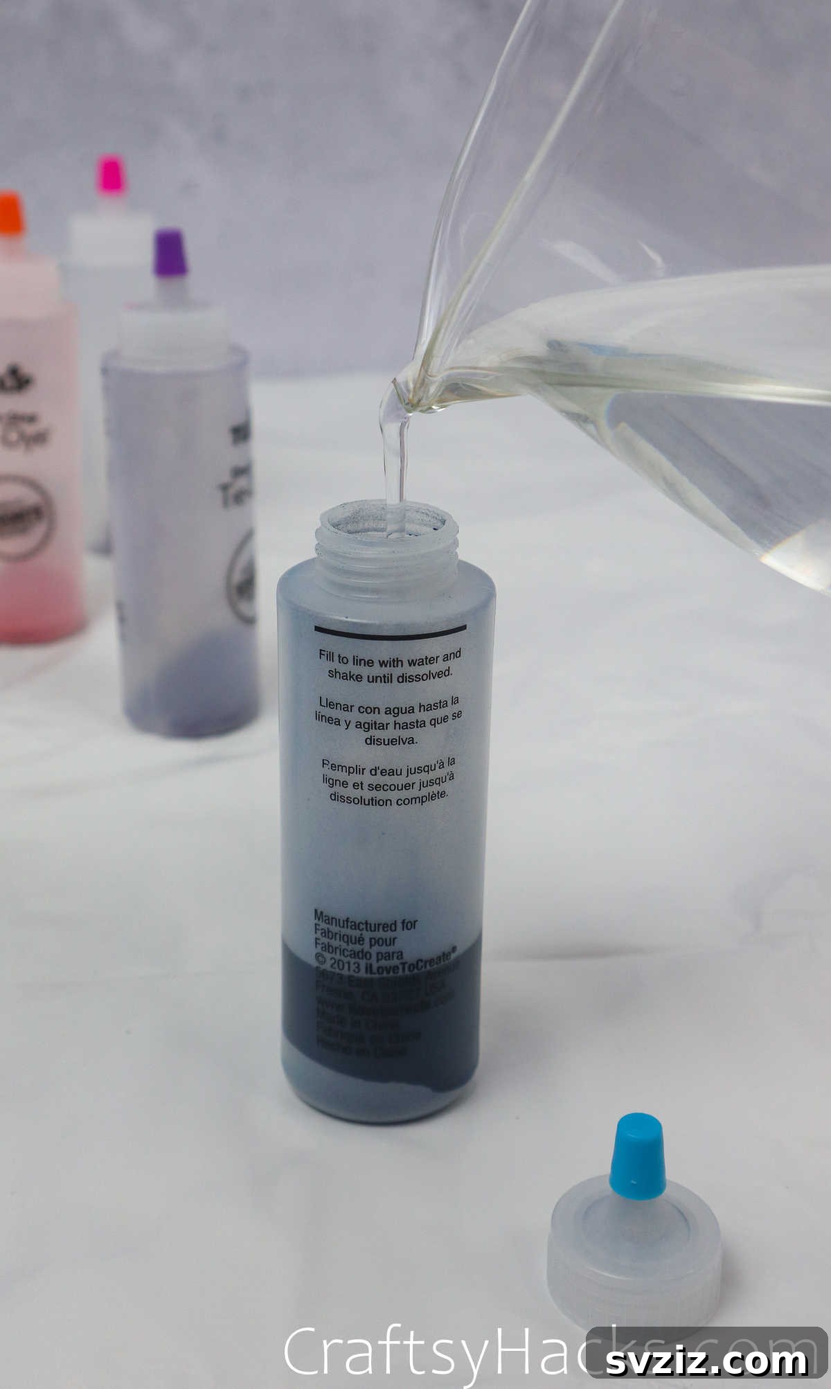 adding water to dye bottles