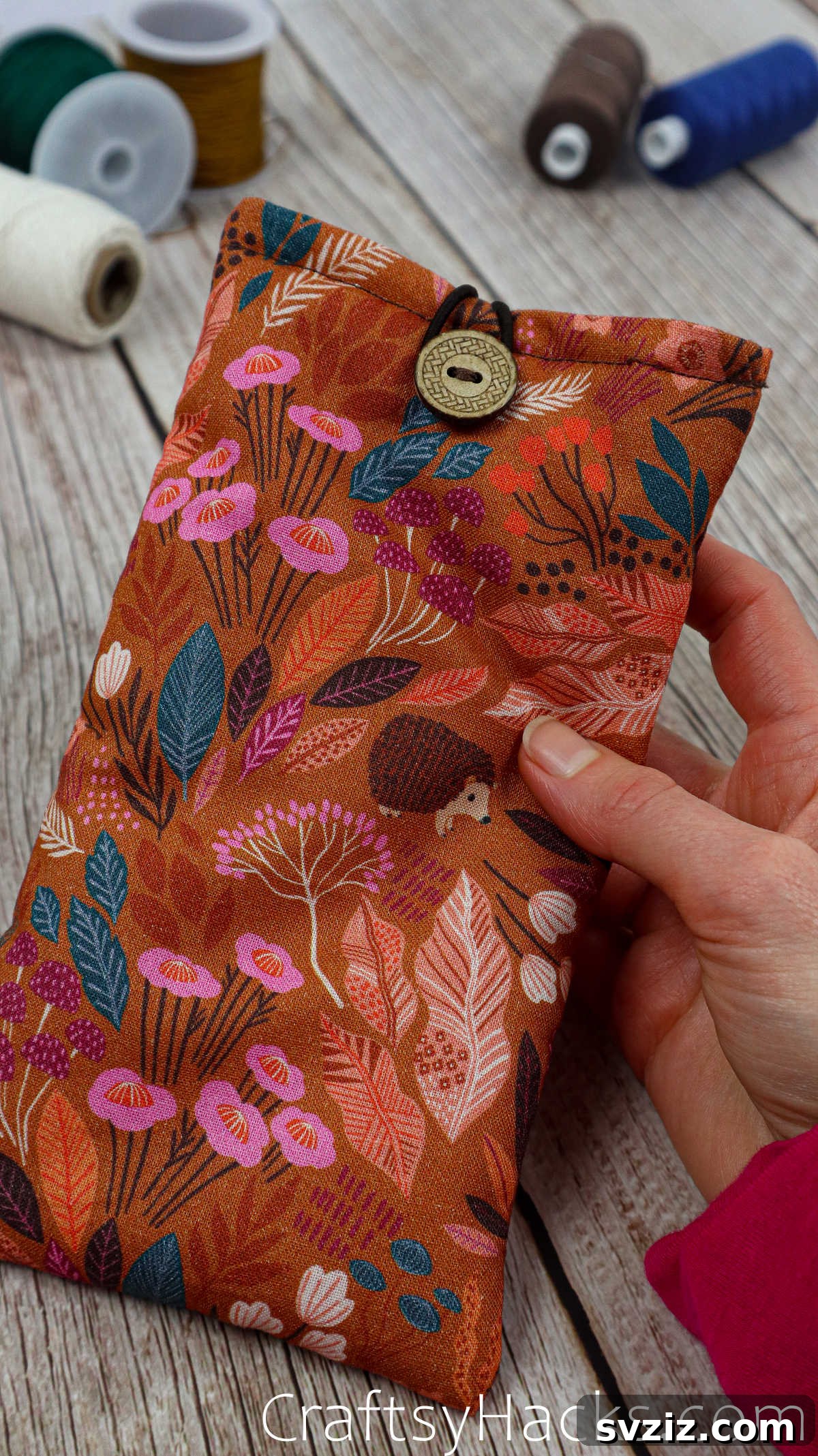 The fully completed DIY fabric phone case, showcasing its vibrant design and functional elegance.