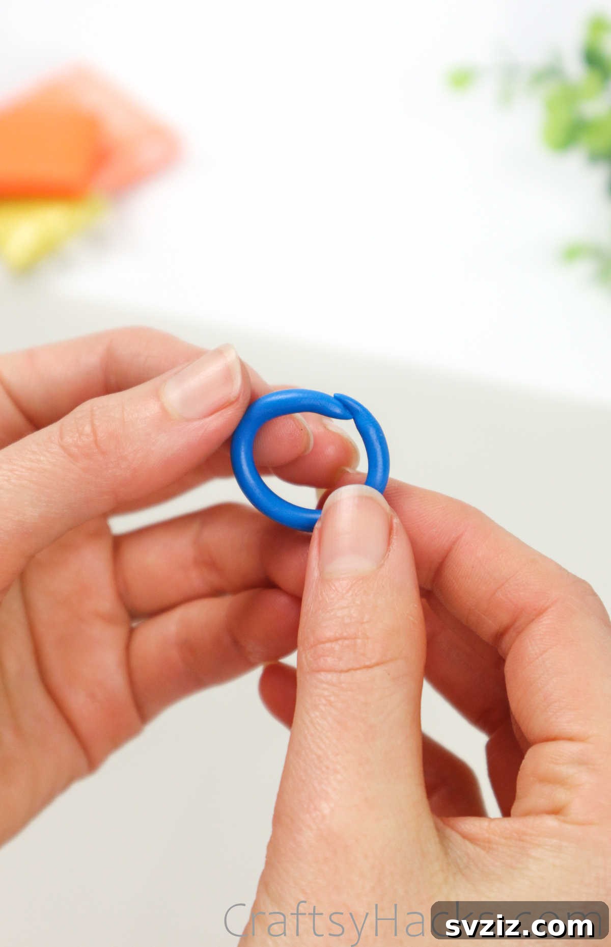 Crafting Your Own Clay Rings Effortlessly 11 A blue polymer clay ring with its ends seamlessly blended together, forming a perfect circle