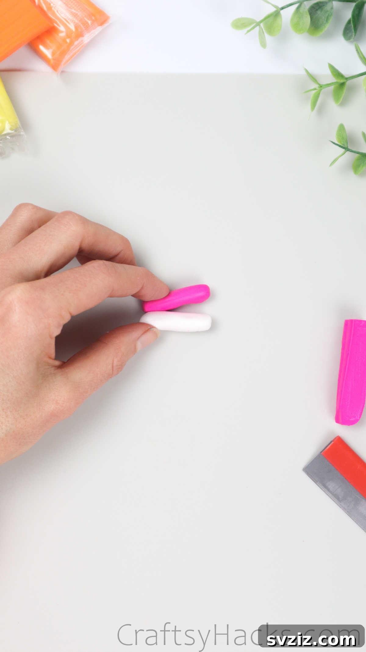 Crafting Your Own Clay Rings Effortlessly 26 Small pieces of pink and white polymer clay, ready to be blended for a marbled effect
