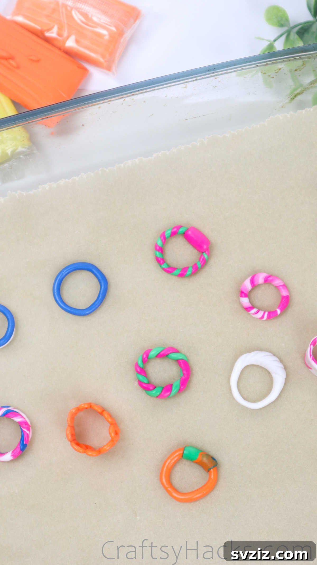 Crafting Your Own Clay Rings Effortlessly 32 Multiple colorful polymer clay rings neatly arranged on a baking tray lined with parchment paper