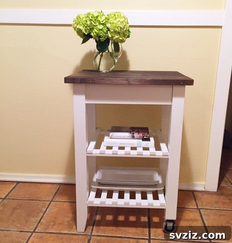 20 Game-Changing IKEA Kitchen Hacks 13 Farmhouse style kitchen cart hack with an IKEA cart, paint, and wood stain
