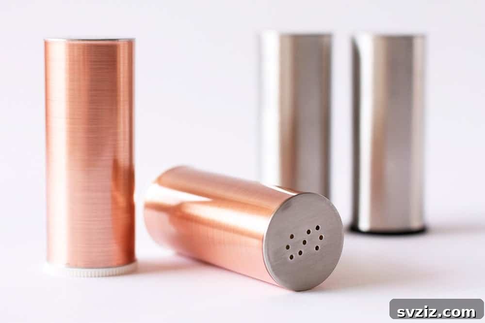 20 Game-Changing IKEA Kitchen Hacks 19 Metallic salt and pepper shakers made using IKEA shakers and copper contact paper