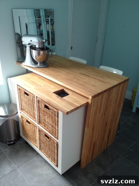 20 Game-Changing IKEA Kitchen Hacks 8 Mobile kitchen island created from an IKEA KALLAX shelf unit with a countertop