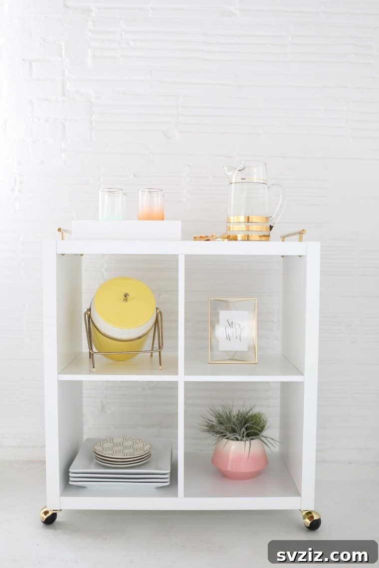 20 Game-Changing IKEA Kitchen Hacks 9 Elegant bar cart hack using an IKEA KALLAX shelf unit with brass casters