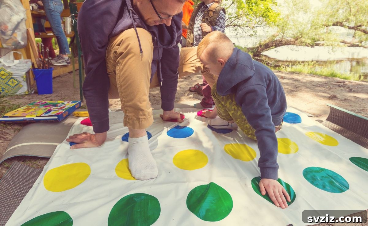 Kids contorting themselves on a giant Lawn Twister mat