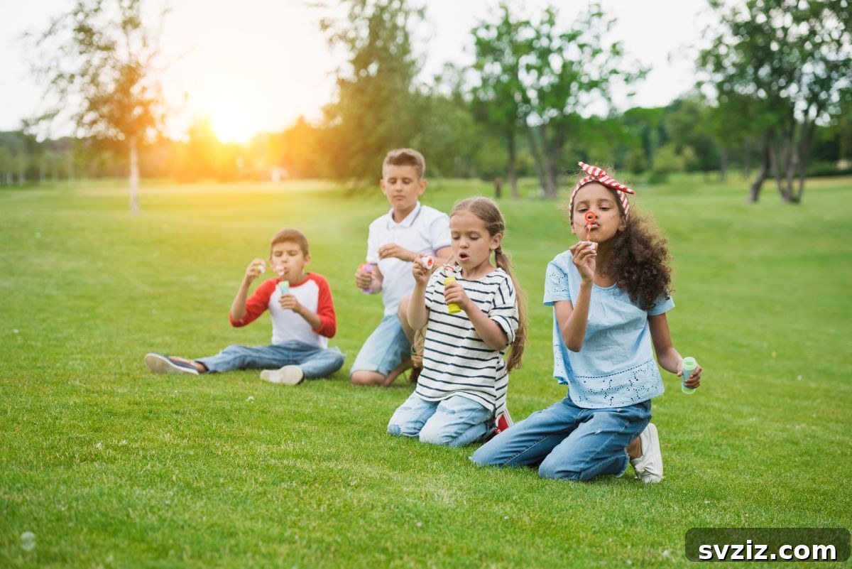Children happily playing with bubbles outdoors