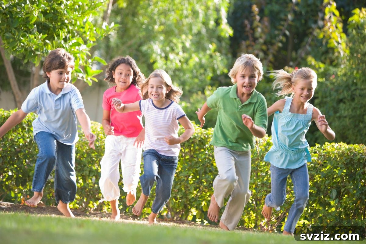 Children playing Red Light Green Light in an open field