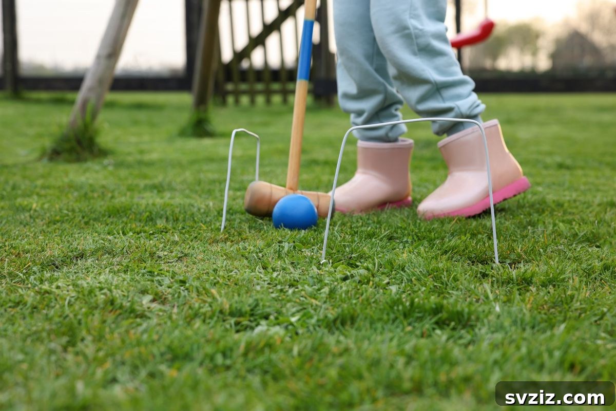 Kids playing Pool Noodle Croquet with colorful hoops