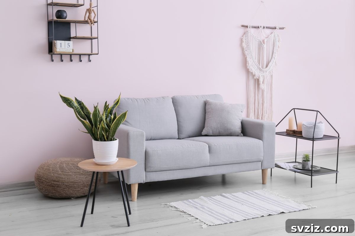 Classic ivory-threaded macrame wall hanging with a lovely draping effect above a sofa