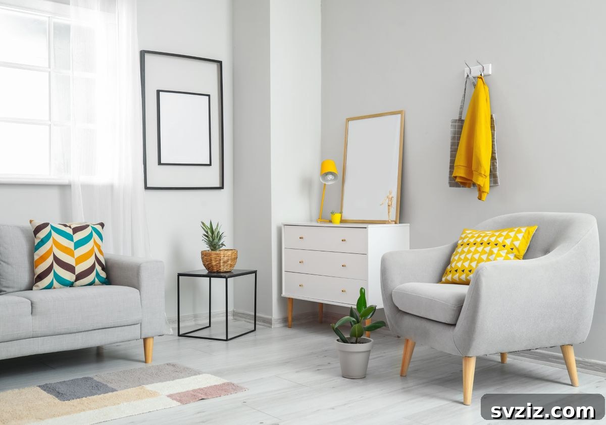 Strategically placed wall hooks above a sofa, used for hanging decor or personal belongings