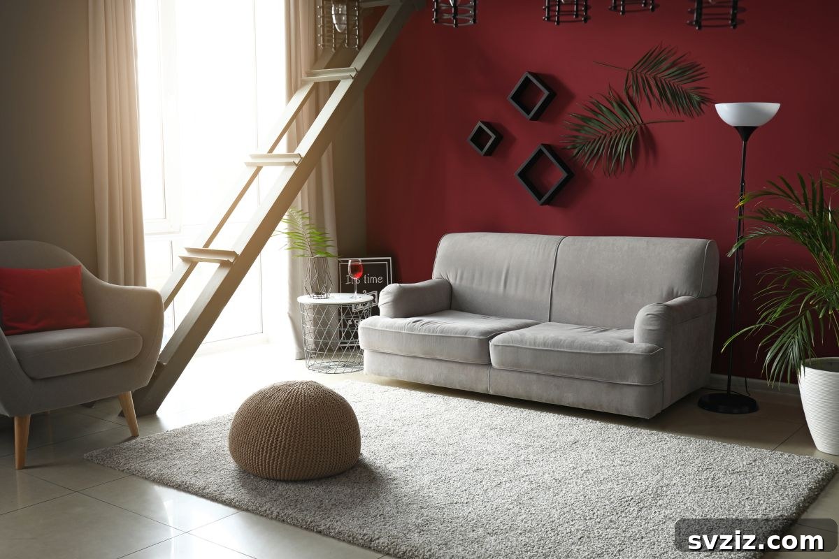 Subtle dark green faux leaf mounted on a wall above a sofa, adding natural class