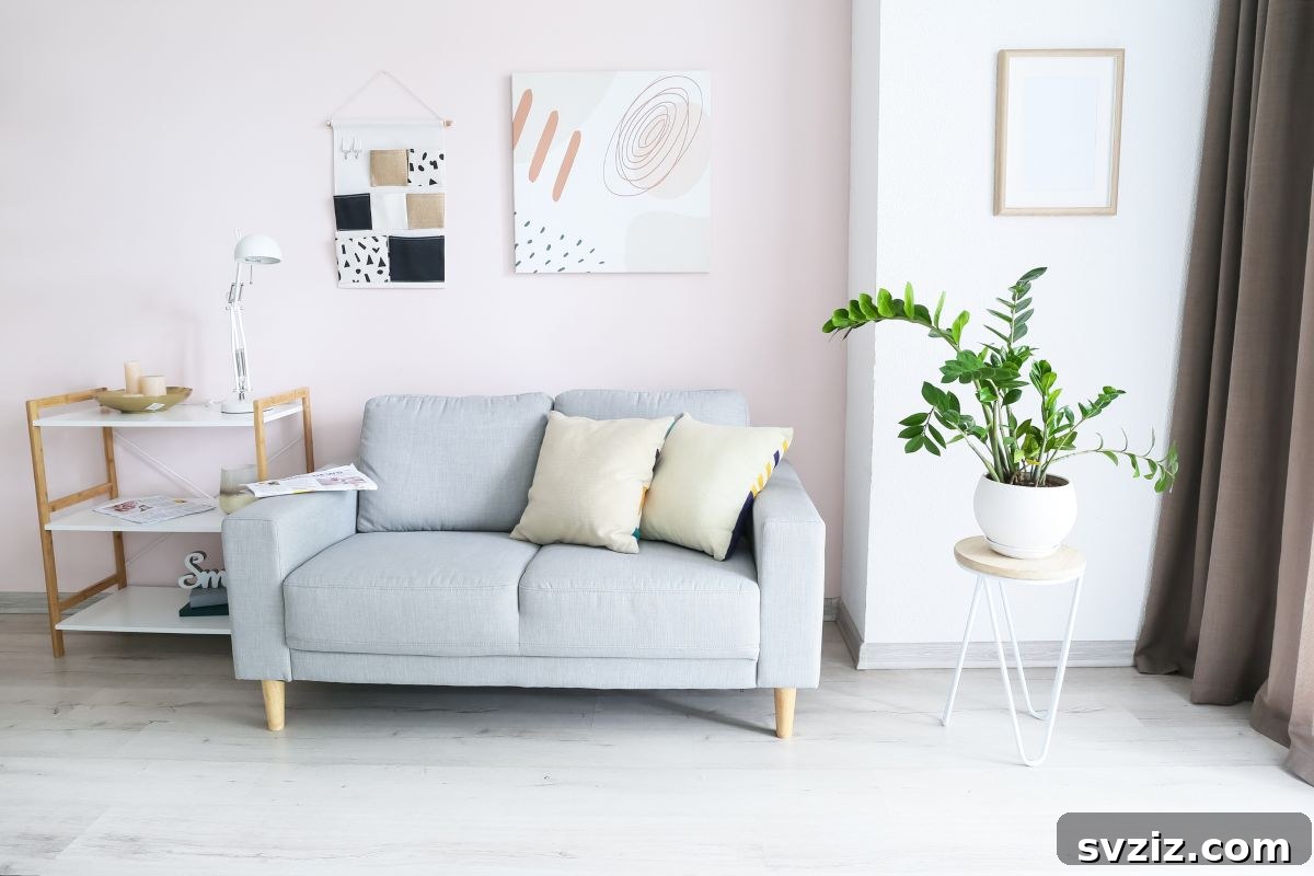 Stylish hanging organizer with pockets above a sofa, combining utility with decor