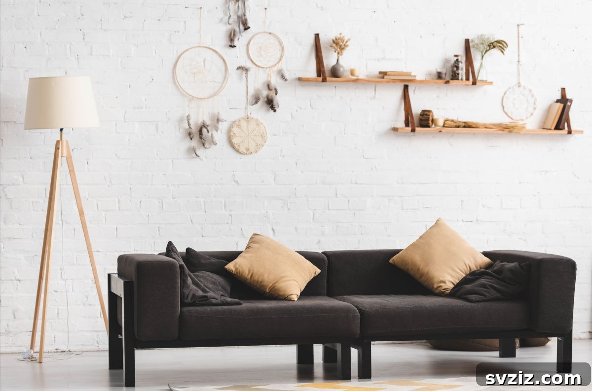 Intricate dreamcatchers creating a bohemian accent wall above a sofa