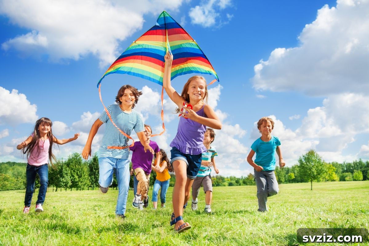 Father and Child Flying a Colorful Kite Outdoors