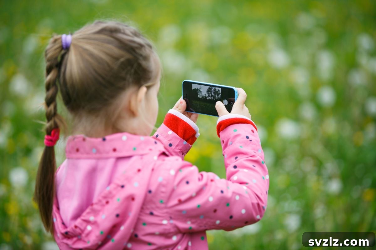 Child Capturing Nature Photos with a Camera Outdoors