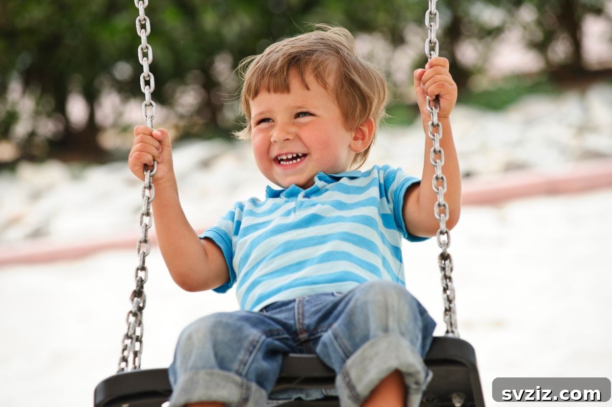 Child Happily Playing on a Backyard Swing Set