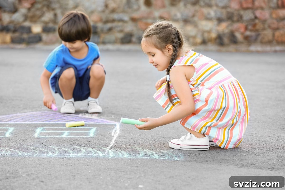 Kids Drawing Colorful Art on Sidewalk with Chalk