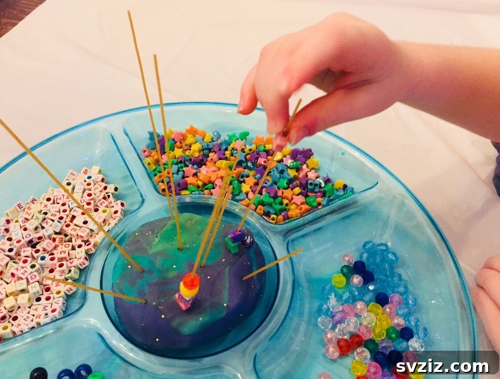 31 Engaging Large Group Activities for Preschoolers 28 Spaghetti Bead Tower Fine Motor Activity