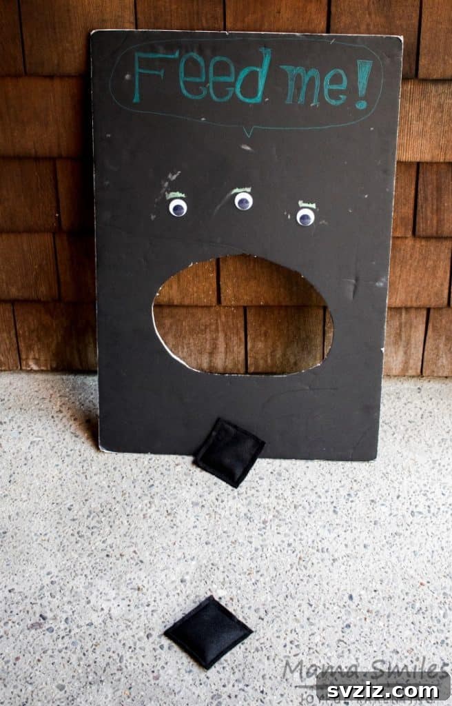 31 Engaging Large Group Activities for Preschoolers 8 Feed Me Monster Bean Bag Toss Game