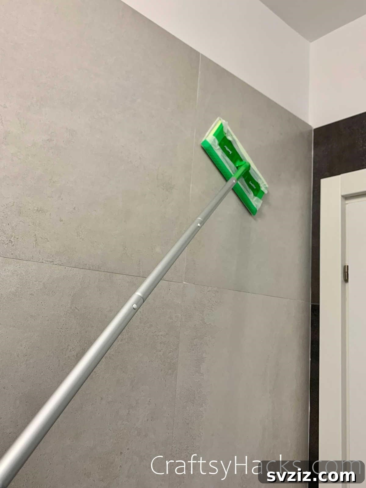 20 Game-Changing Cleaning Hacks to Reclaim Your Time 11 Cleaning bathroom walls with a Swiffer