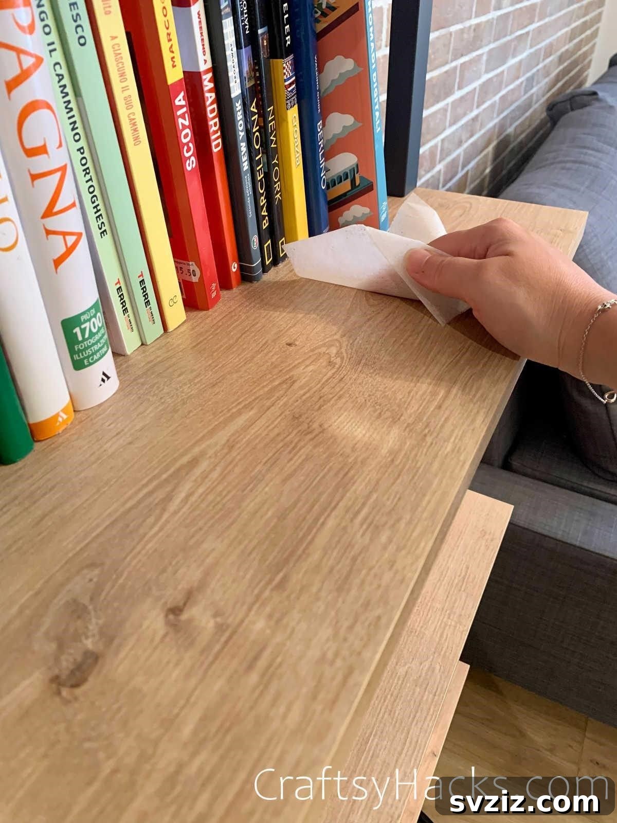 20 Game-Changing Cleaning Hacks to Reclaim Your Time 18 Dryer sheets being used for dusting furniture