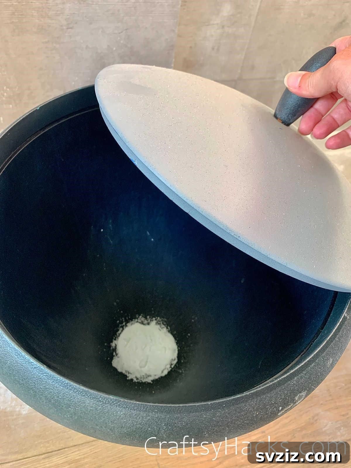 20 Game-Changing Cleaning Hacks to Reclaim Your Time 19 Baking soda at the bottom of a bin to remove smells