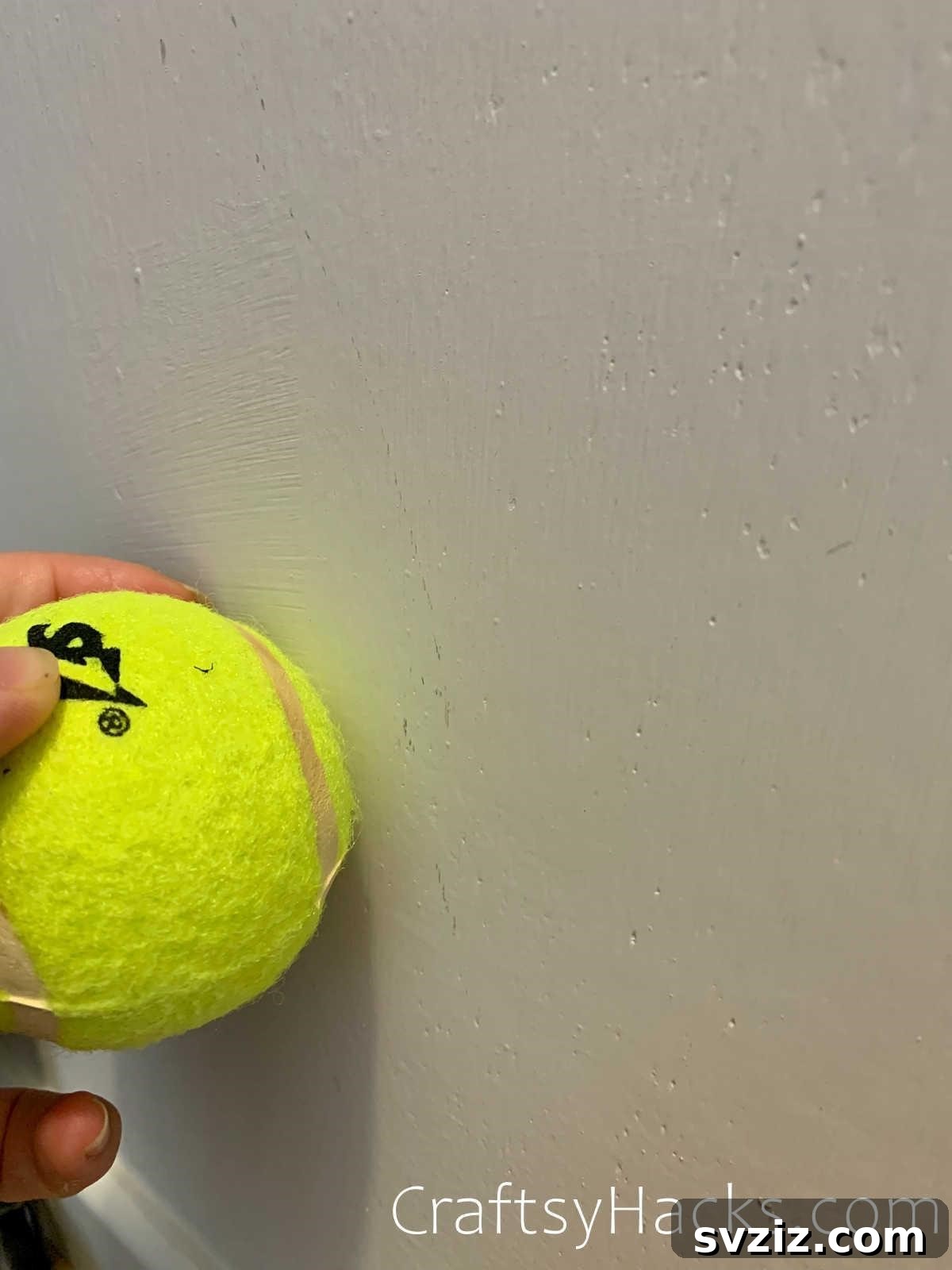 20 Game-Changing Cleaning Hacks to Reclaim Your Time 20 Removing scuff marks from a wall with a tennis ball