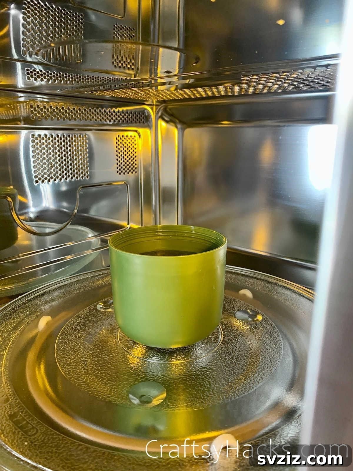 20 Game-Changing Cleaning Hacks to Reclaim Your Time 5 White wine vinegar in a bowl inside a microwave for cleaning