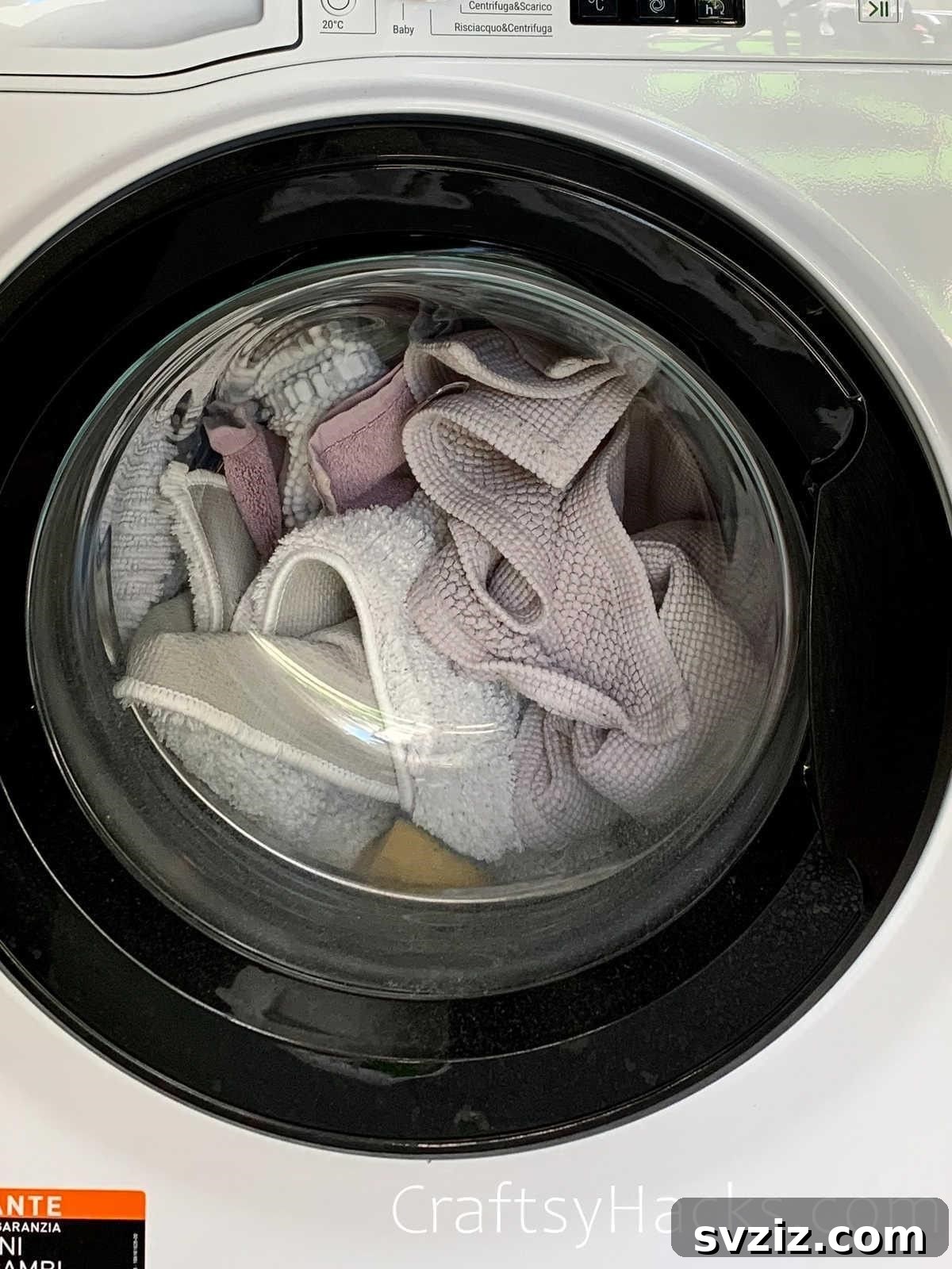 20 Game-Changing Cleaning Hacks to Reclaim Your Time 6 Dish sponge being sanitized in a washing machine