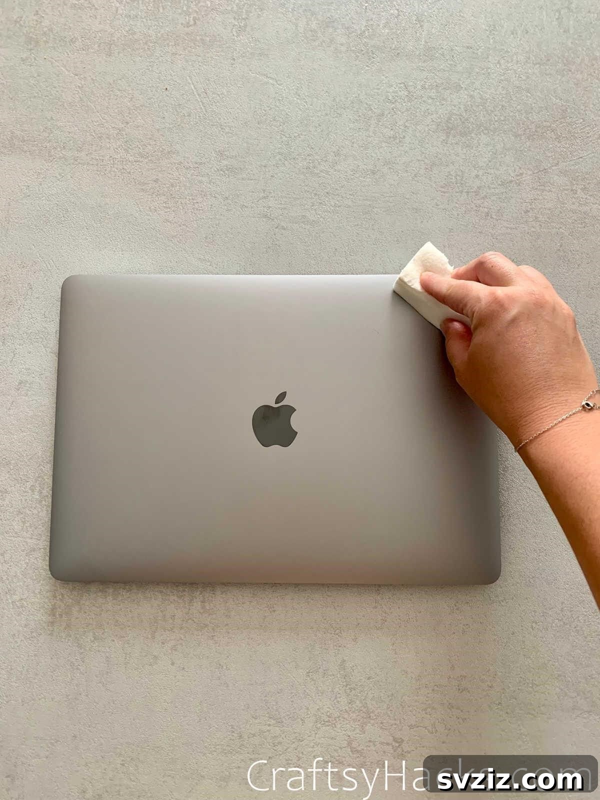 21 Ingenious Magic Eraser Solutions 5 Clean laptop exterior with Magic Eraser