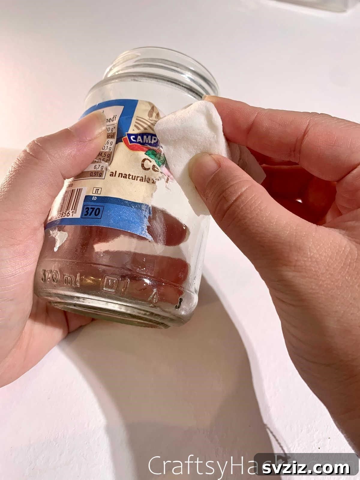 21 Ingenious Magic Eraser Solutions 6 Remove sticky labels from glass jars