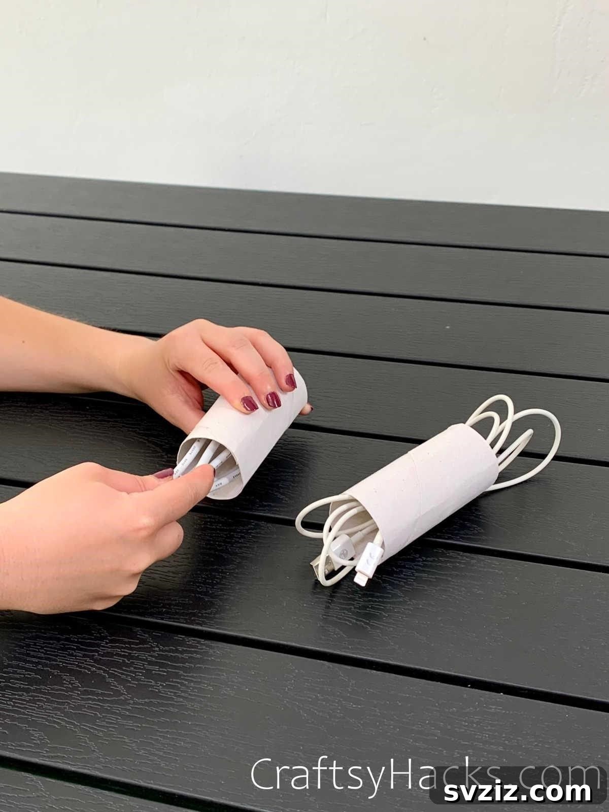 Organize cords in toilet paper rolls for a tidy and accessible cable storage