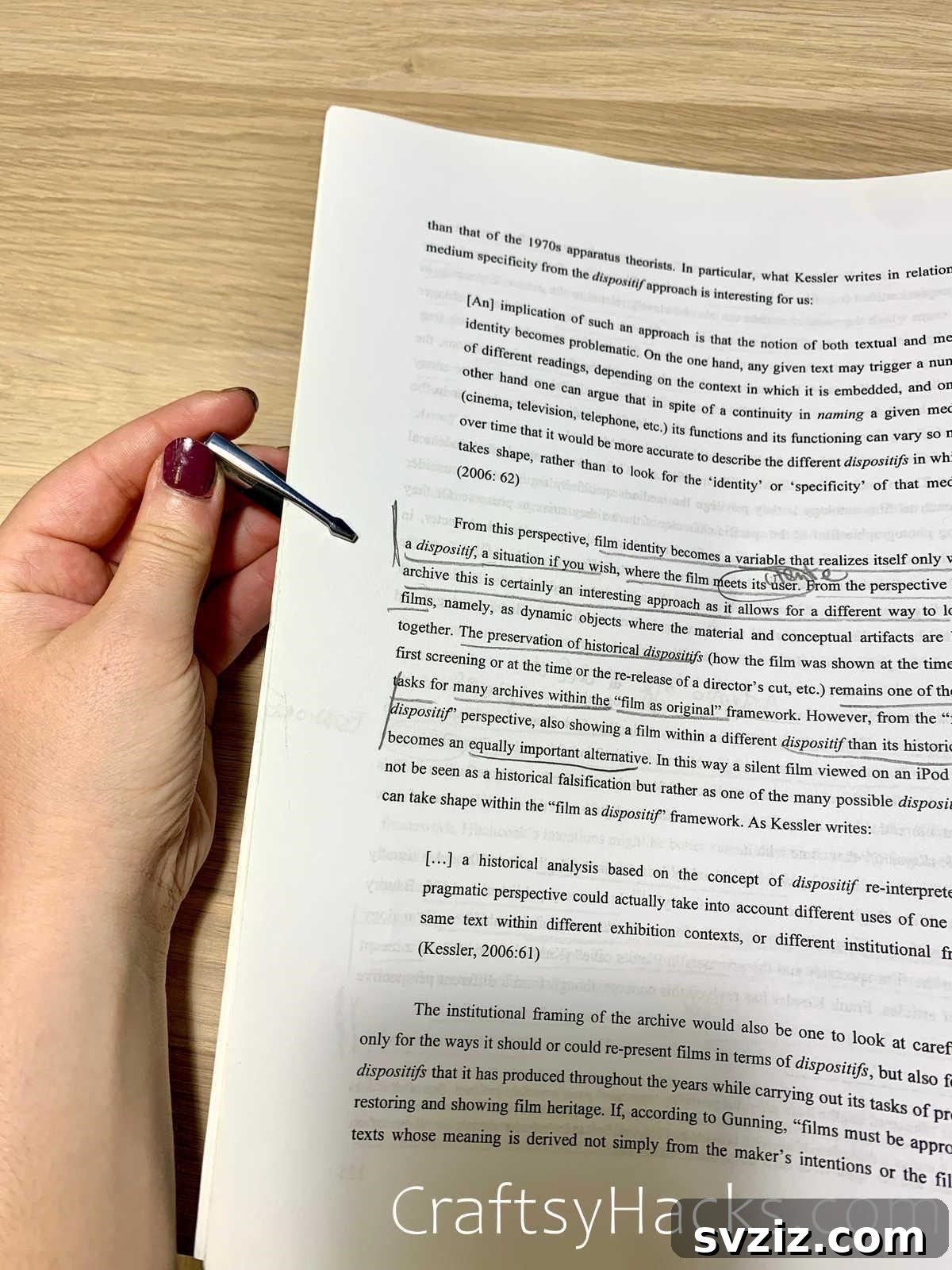 Keep textbooks open with a pen for hands-free reading