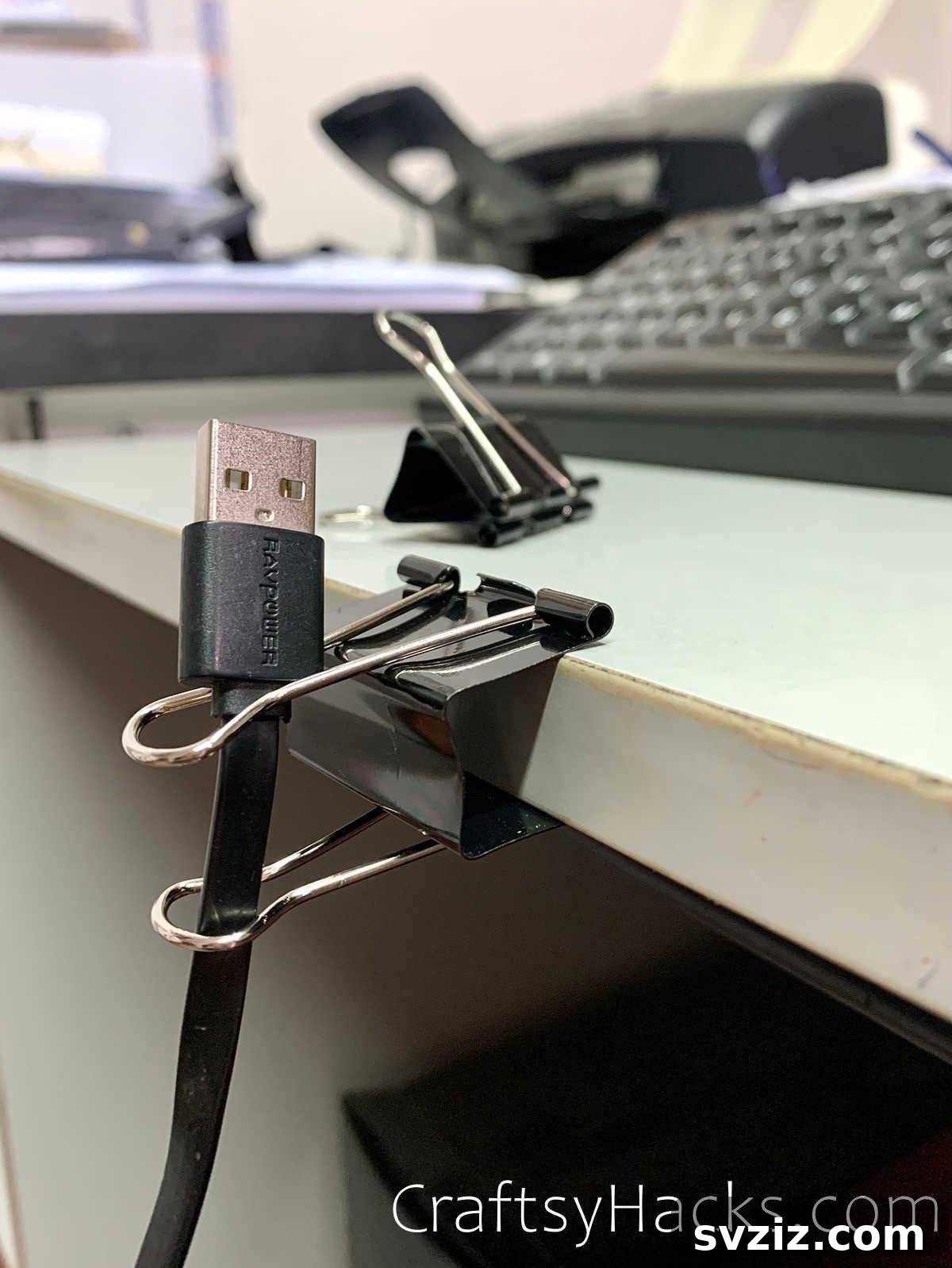 Binder clips to organize wires around your desk for a clutter-free space