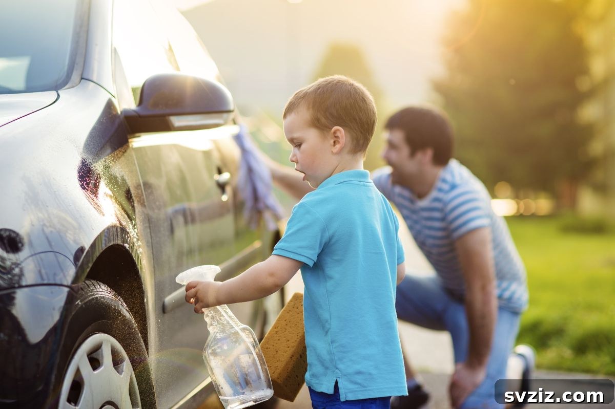 Little Explorers: 41 Outdoor Play Ideas for Preschoolers 35 Kids playing in a homemade outdoor car wash with PVC pipes and streamers