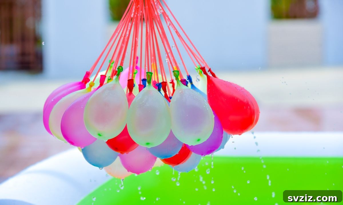 Little Explorers: 41 Outdoor Play Ideas for Preschoolers 39 Kids playing water balloon piñata outdoors on a sunny day